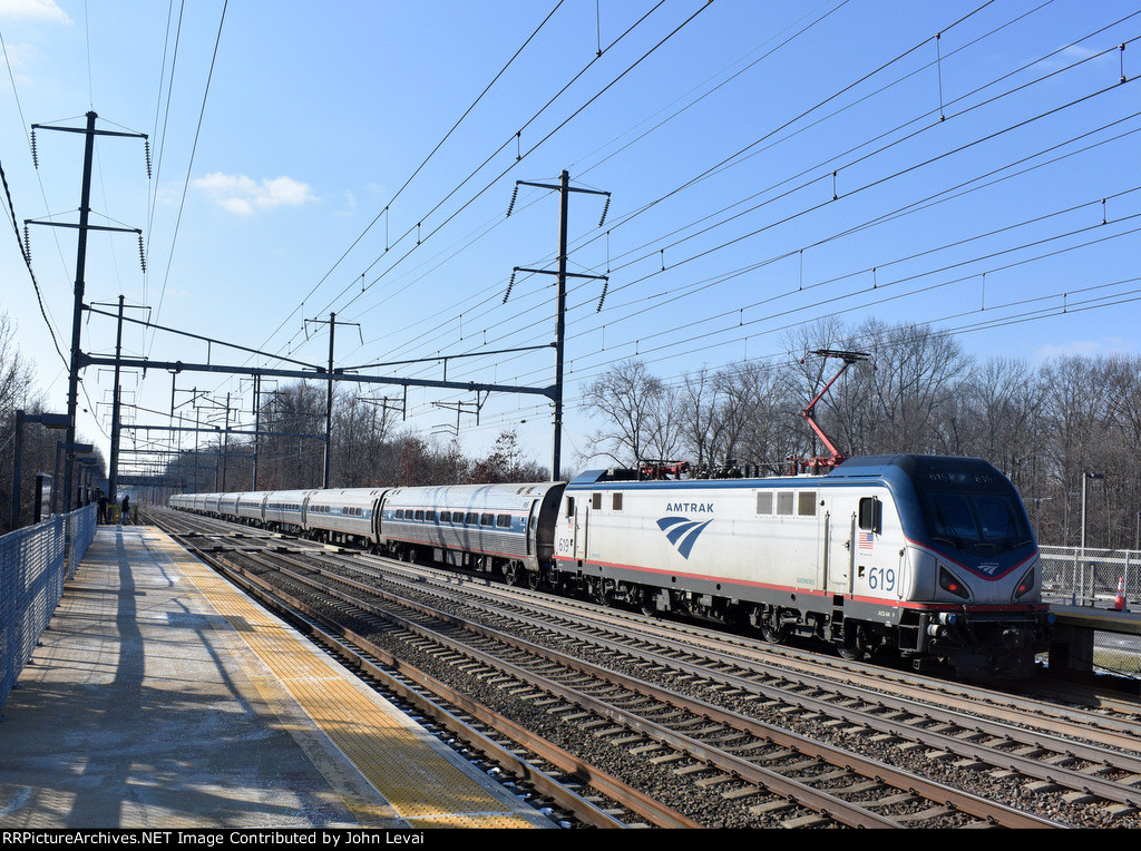  Sprinter # 619 pushing Amtrak NER Train # 121 out of PJC-what is unique about NER Train # 121 is that it uses both a standard Northeast Regional Set of eight cars attached to a typical Keystone set of five cars.